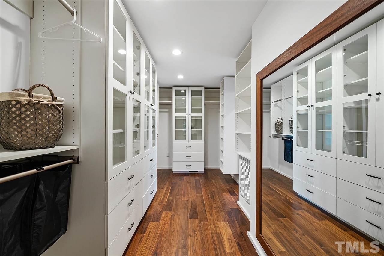 6900 Denlee Road Raleigh, NC 27603 - Photo 18 of 30 a view of hallway with wooden floor and staircase