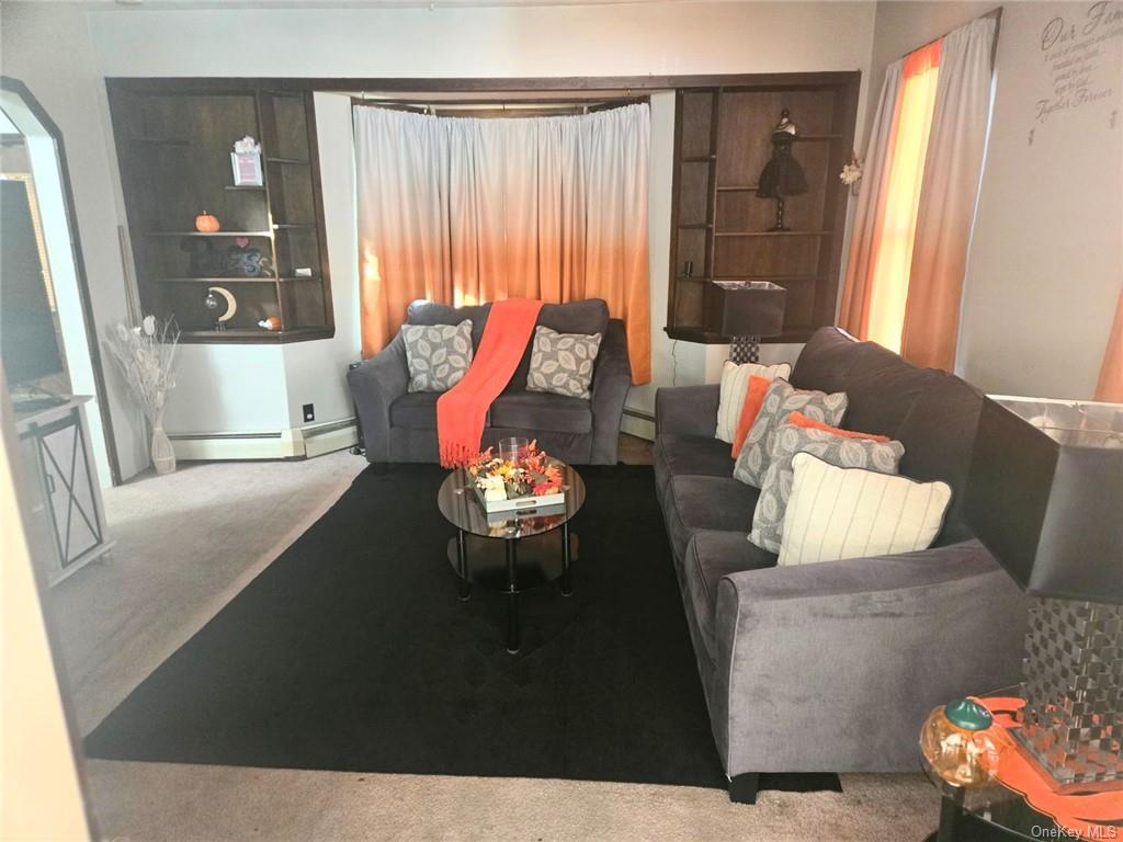 6 Fox Street Poughkeepsie, NY 12601 - Photo 2 of 6 a living room with furniture and wooden floor