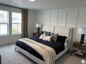 12 South Moonlit Road Mapleton, UT 84664 - Photo 5 of 14 Bedroom with light carpet and a decorative wall