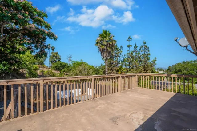 a view of a backyard with a patio