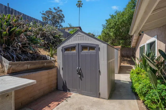 a view of a backyard with a patio