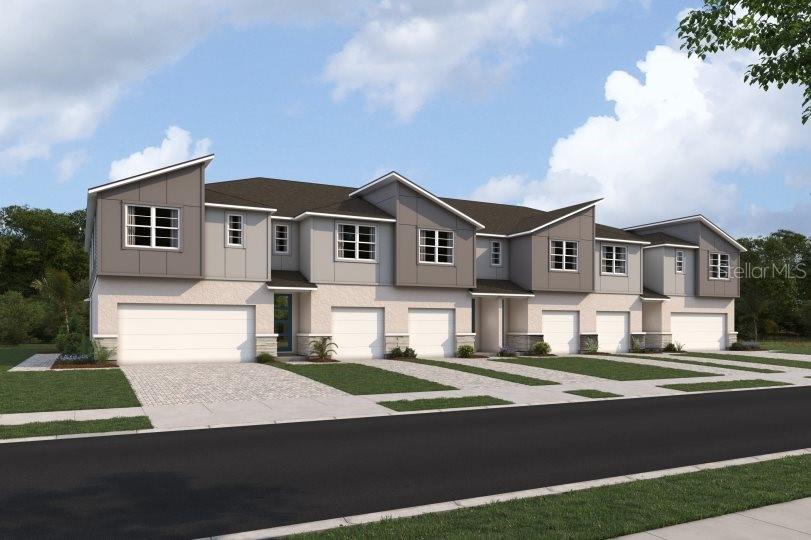 8838 Ginko Run Parrish, FL 34219 - Photo 1 of 21 a front view of a house with a yard