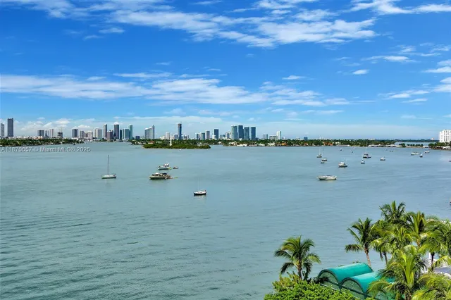 a view of swimming pool from a balcony