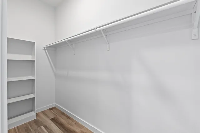 a view of an empty walk in closet