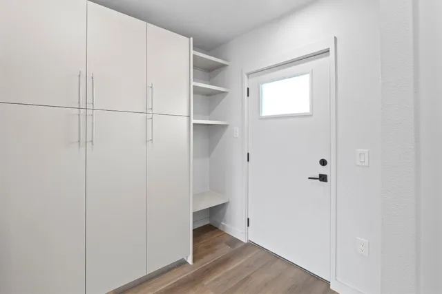 a view of small space with wooden floor