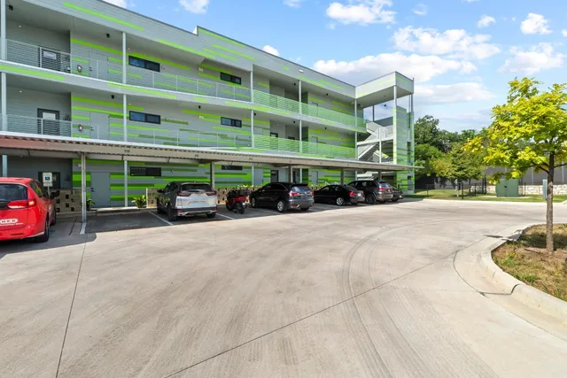 a car parked in front of a building