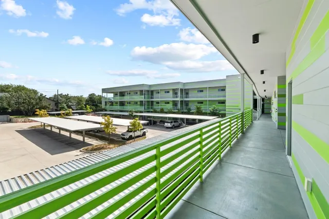 a view of swimming pool from a balcony