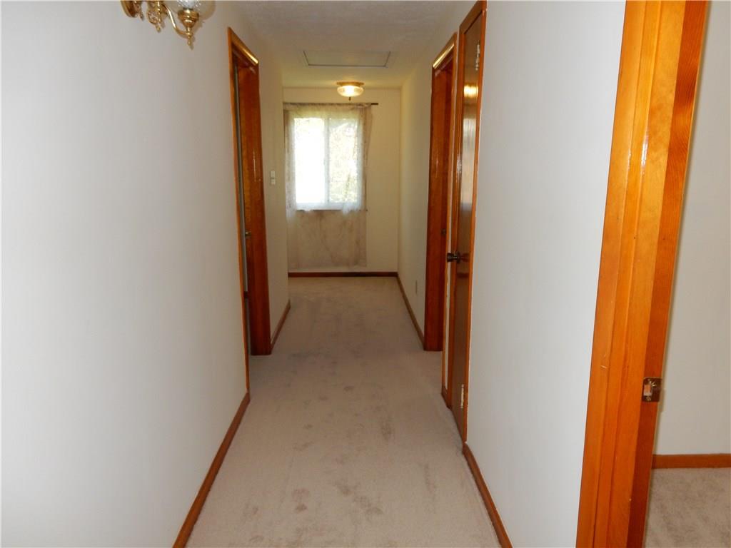 3719 Schuette Road Pittsburgh, PA 15227 - Photo 16 of 24 The hallway on the upper level, you will have no problem getting your furniture in this home! I know you can't see it but around the bend is rounded, very unique.
