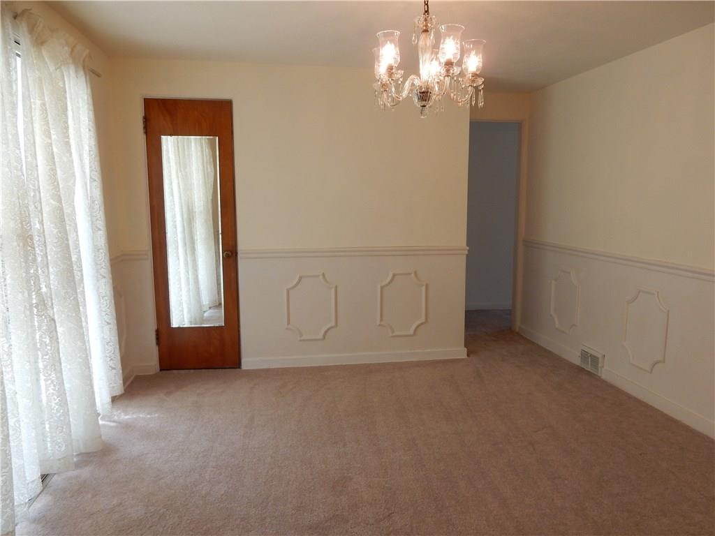 3719 Schuette Road Pittsburgh, PA 15227 - Photo 6 of 24 Look how nice the dining area is! Large closet, new carpet. Entry to the sun room is off to the left. I'm standing in the kitchen doorway