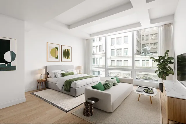 a kitchen with stainless steel appliances a sink and a refrigerator