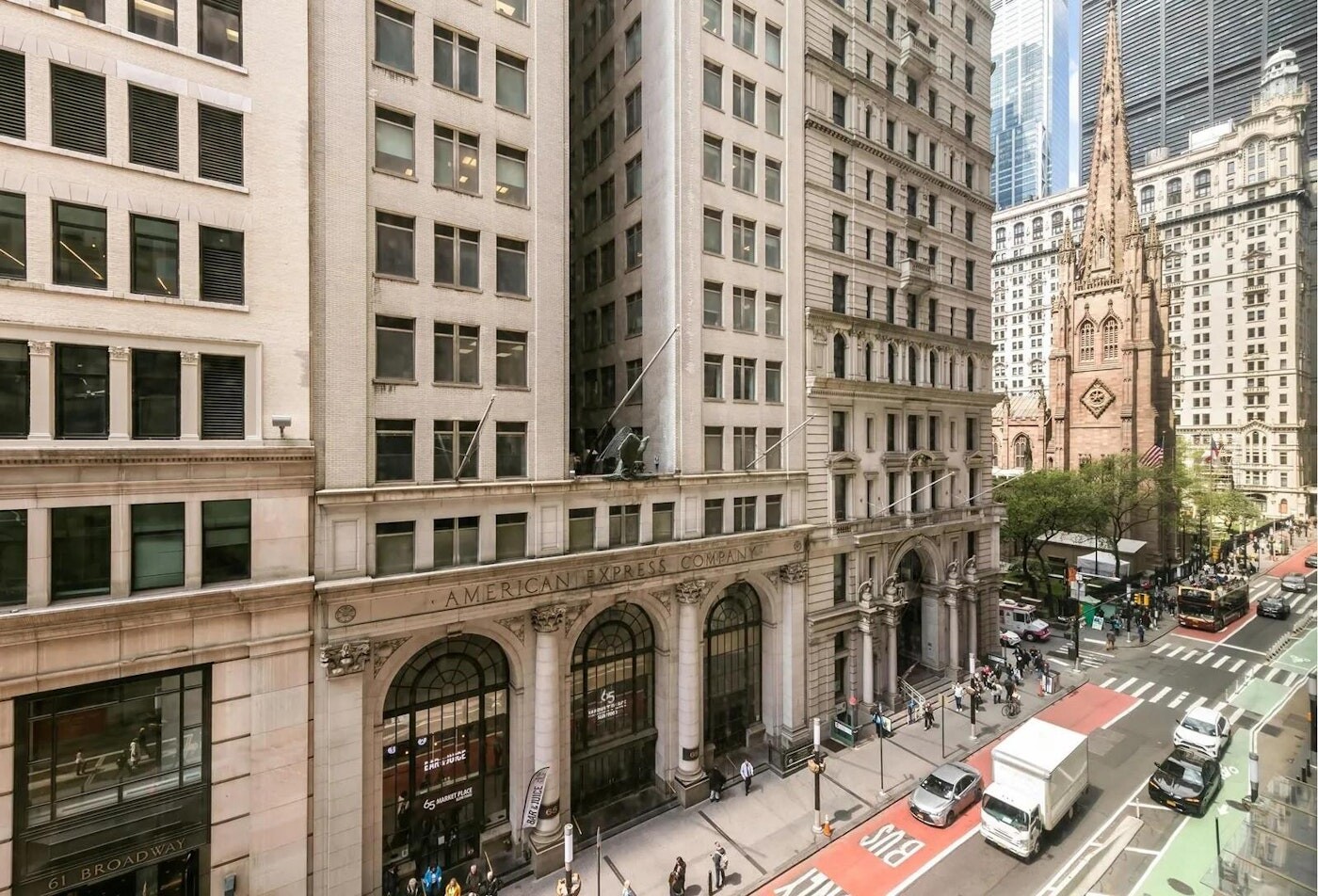 1 Wall Street, Unit 607 Manhattan, NY 10005 - Photo 5 of 14 a front view of a building with glass windows