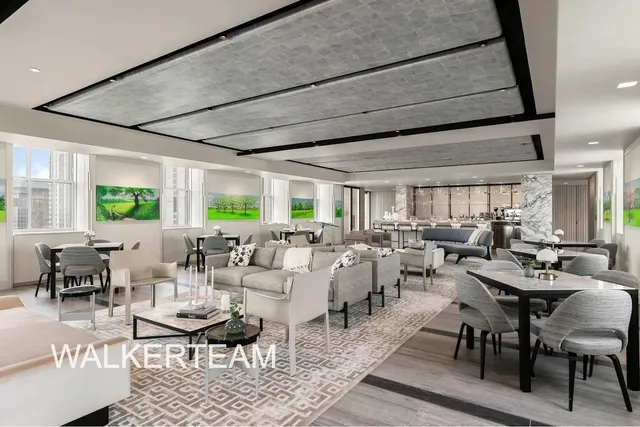 a very nice looking living room with lots of furniture and a large window