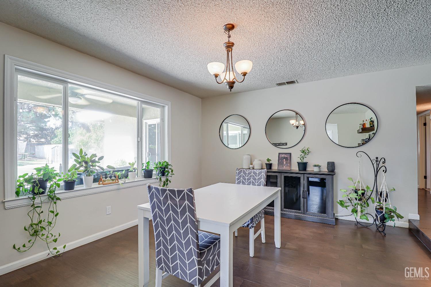 Undisclosed Address Bakersfield, CA 93308 - Photo 8 of 38 a view of a dining room and a livingroom