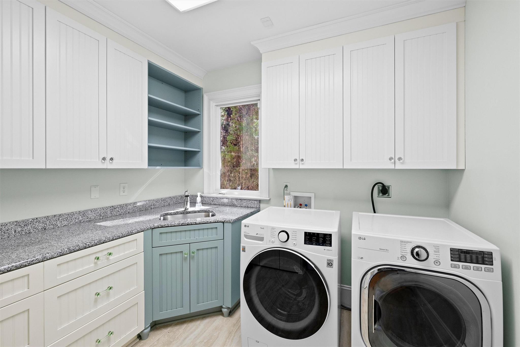 16824 Flying Jib Road Cornelius, NC 28031 - Photo 19 of 48 a view of a storage and utility room with washer and dryer