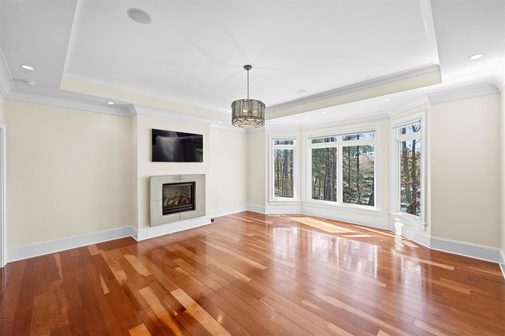 16824 Flying Jib Road Cornelius, NC 28031 - Photo 21 of 48 a view of an empty room with window and fire place