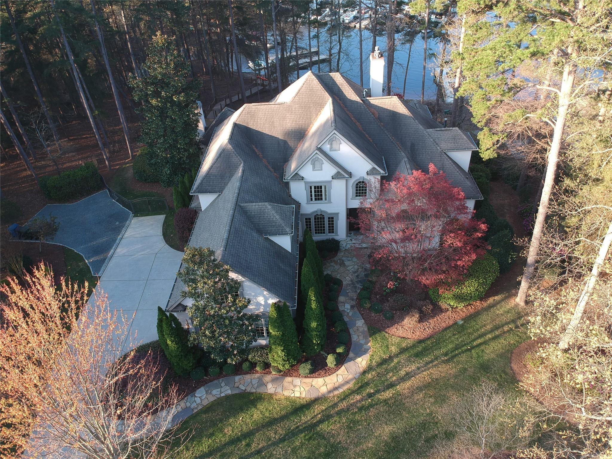 16824 Flying Jib Road Cornelius, NC 28031 - Photo 48 of 48 a front view of a house with a yard and fountain