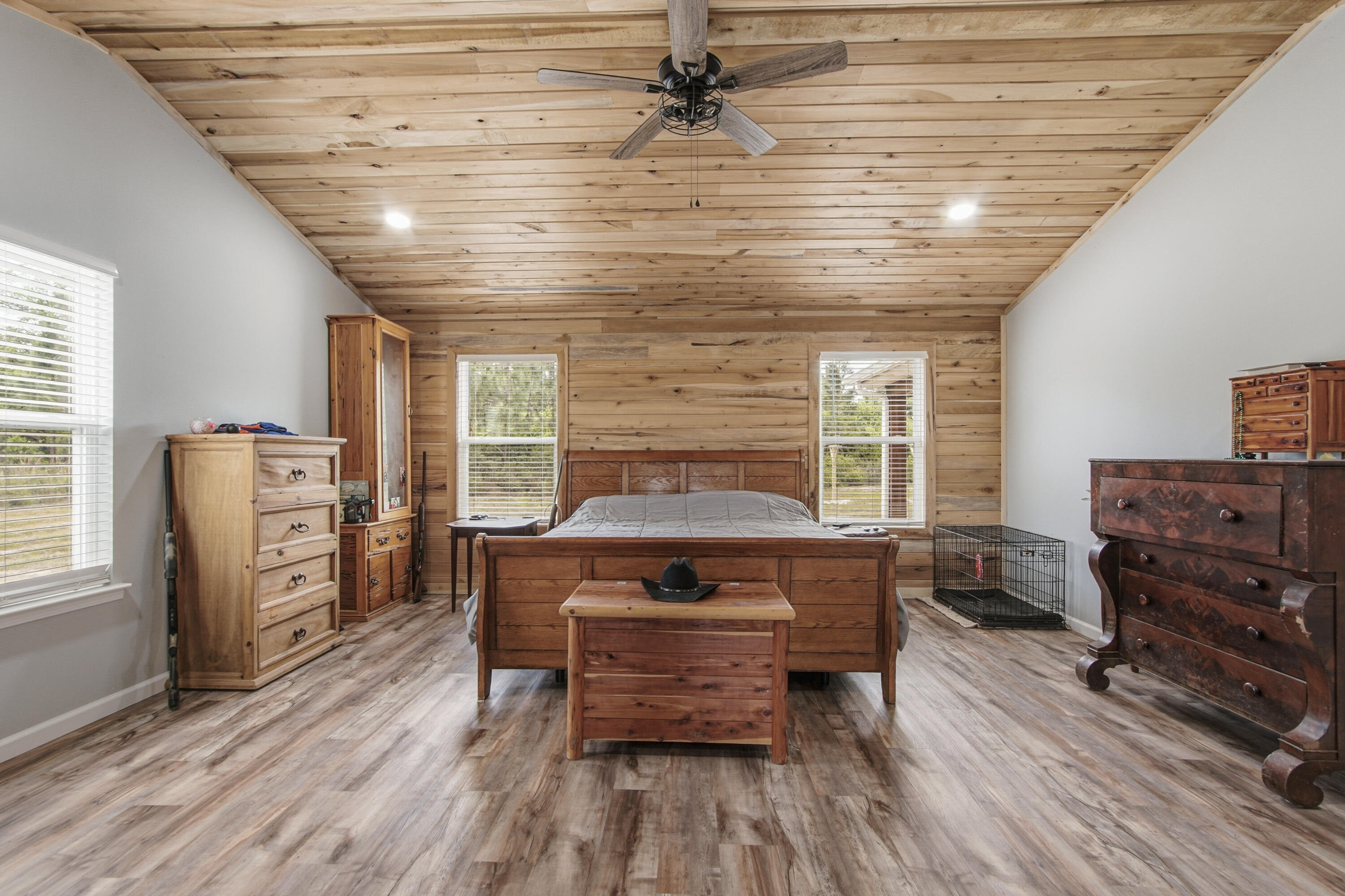 7514 Laird Road Florala, AL 36442 - Photo 15 of 48 a bedroom with furniture and wooden floor