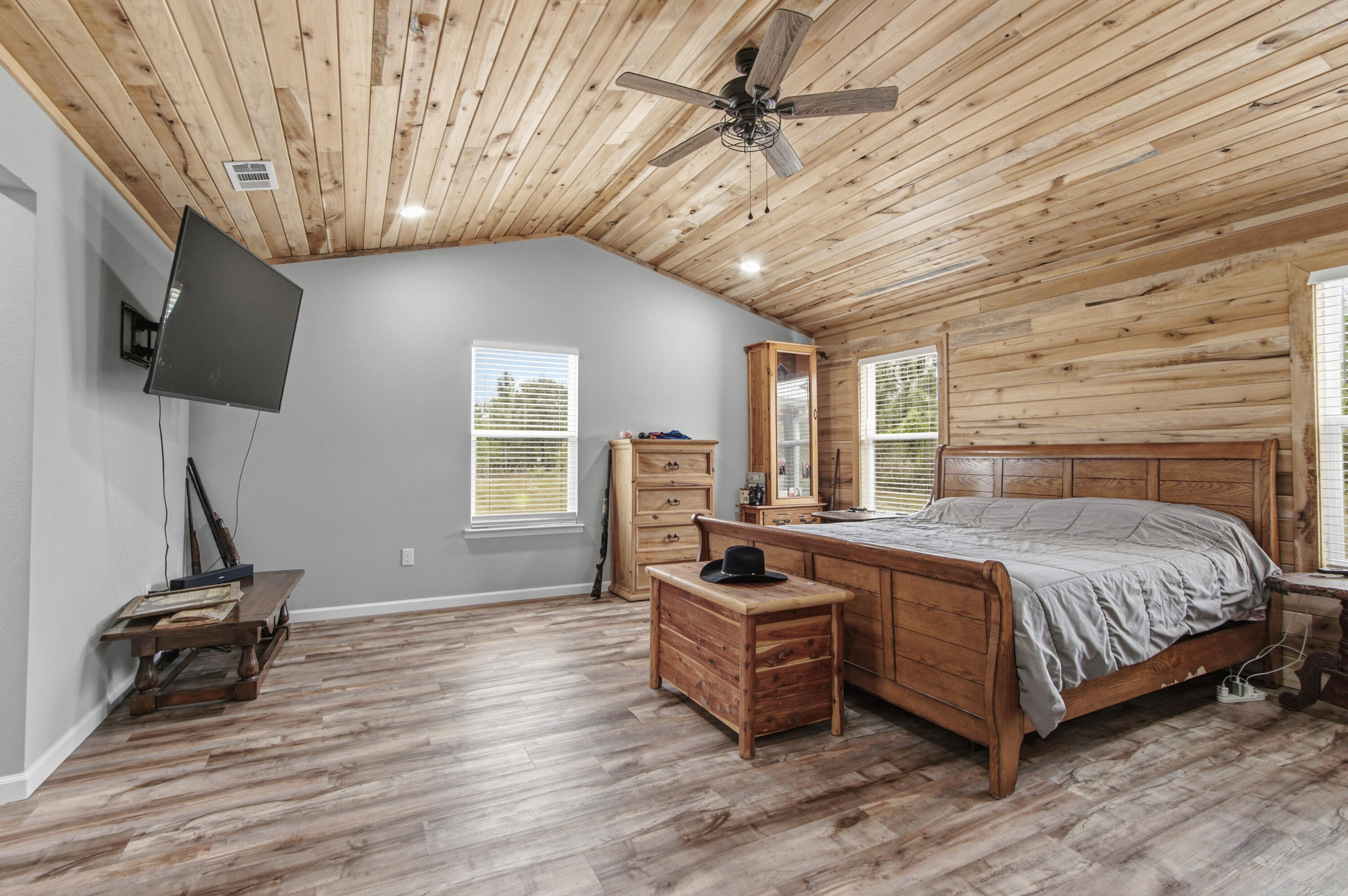 7514 Laird Road Florala, AL 36442 - Photo 18 of 48 a bedroom with a bed and a flat screen tv