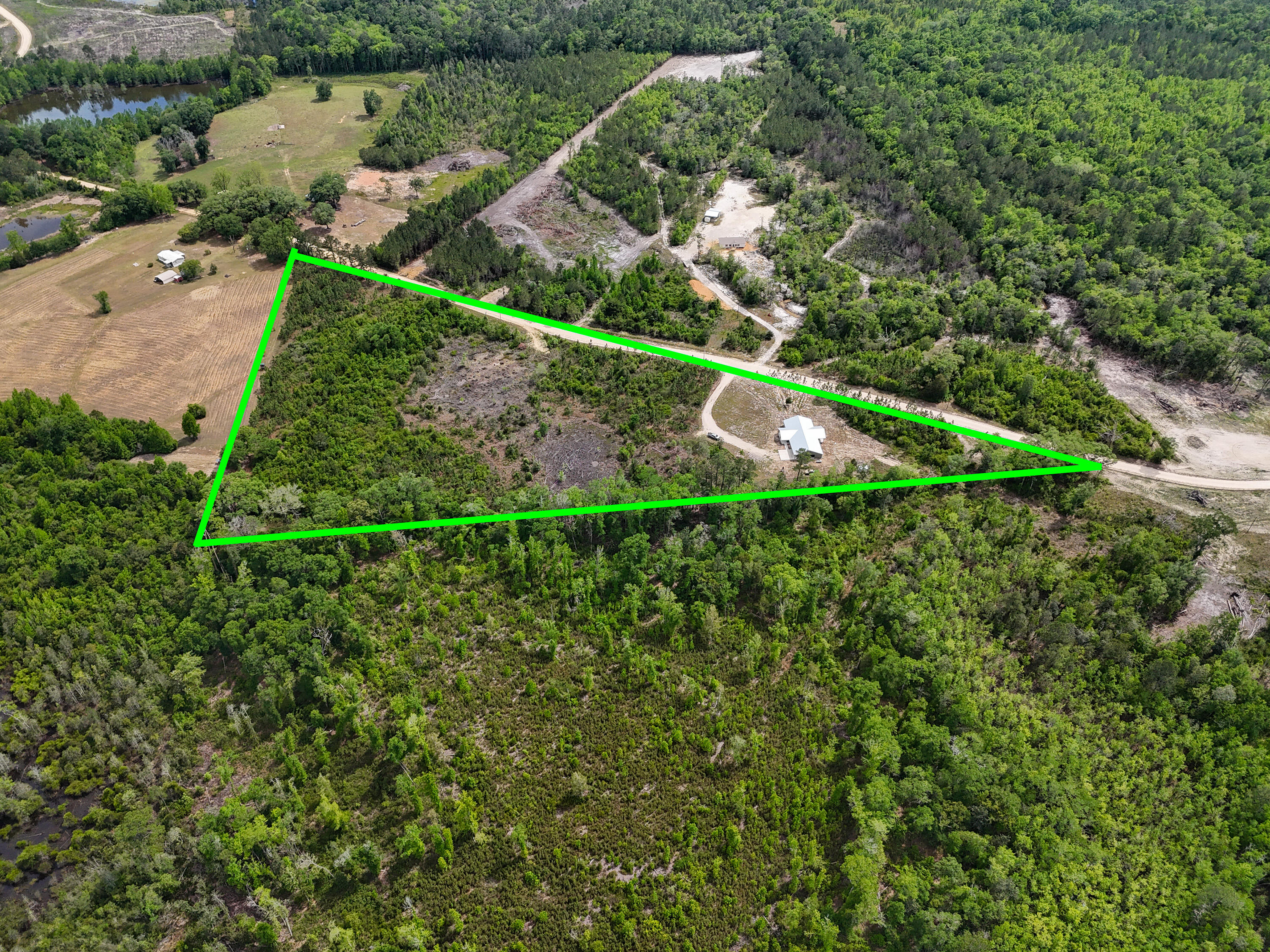 7514 Laird Road Florala, AL 36442 - Photo 2 of 48 an aerial view of a house with a yard