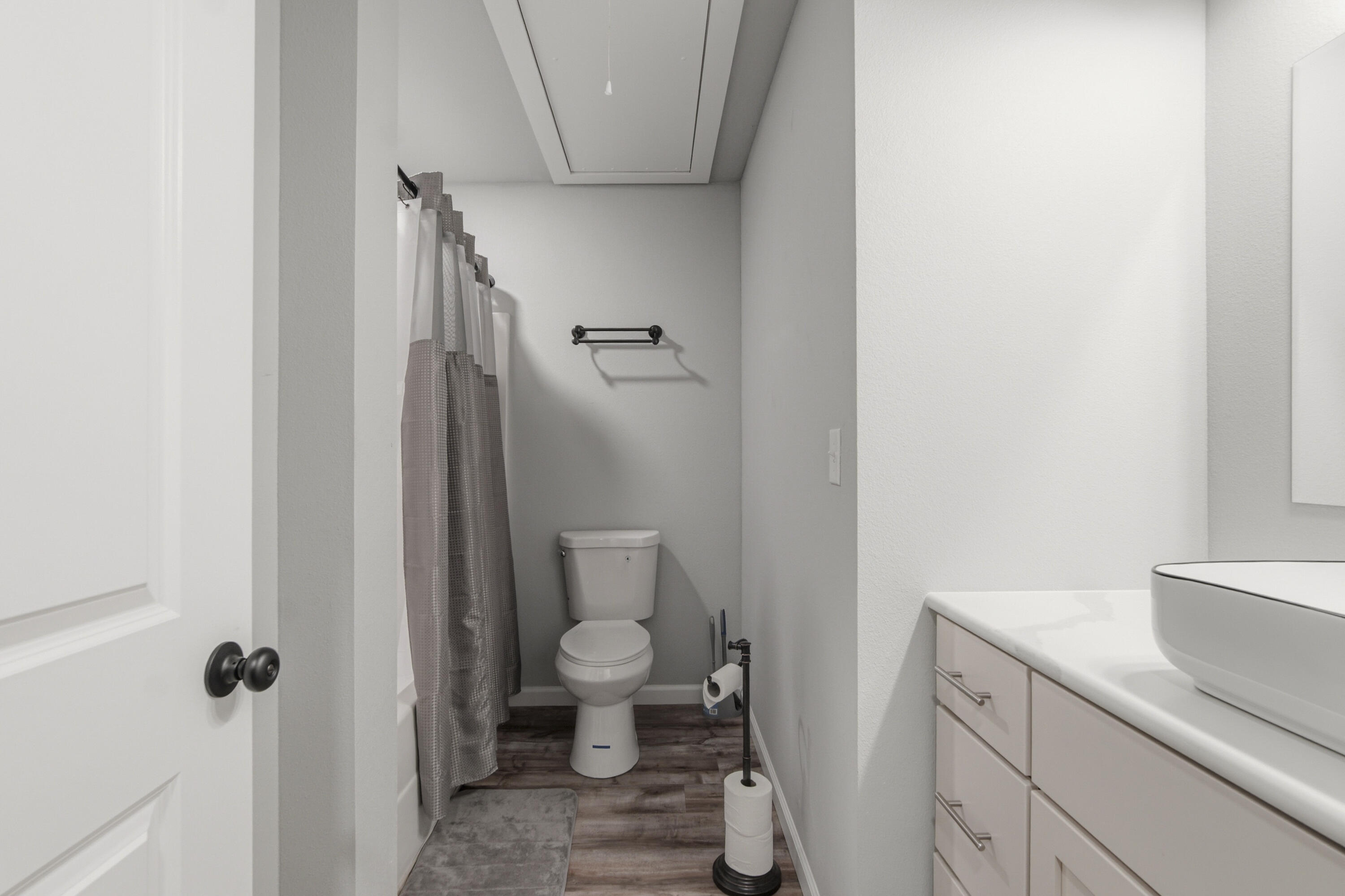 7514 Laird Road Florala, AL 36442 - Photo 25 of 48 a bathroom with a granite countertop toilet and a sink