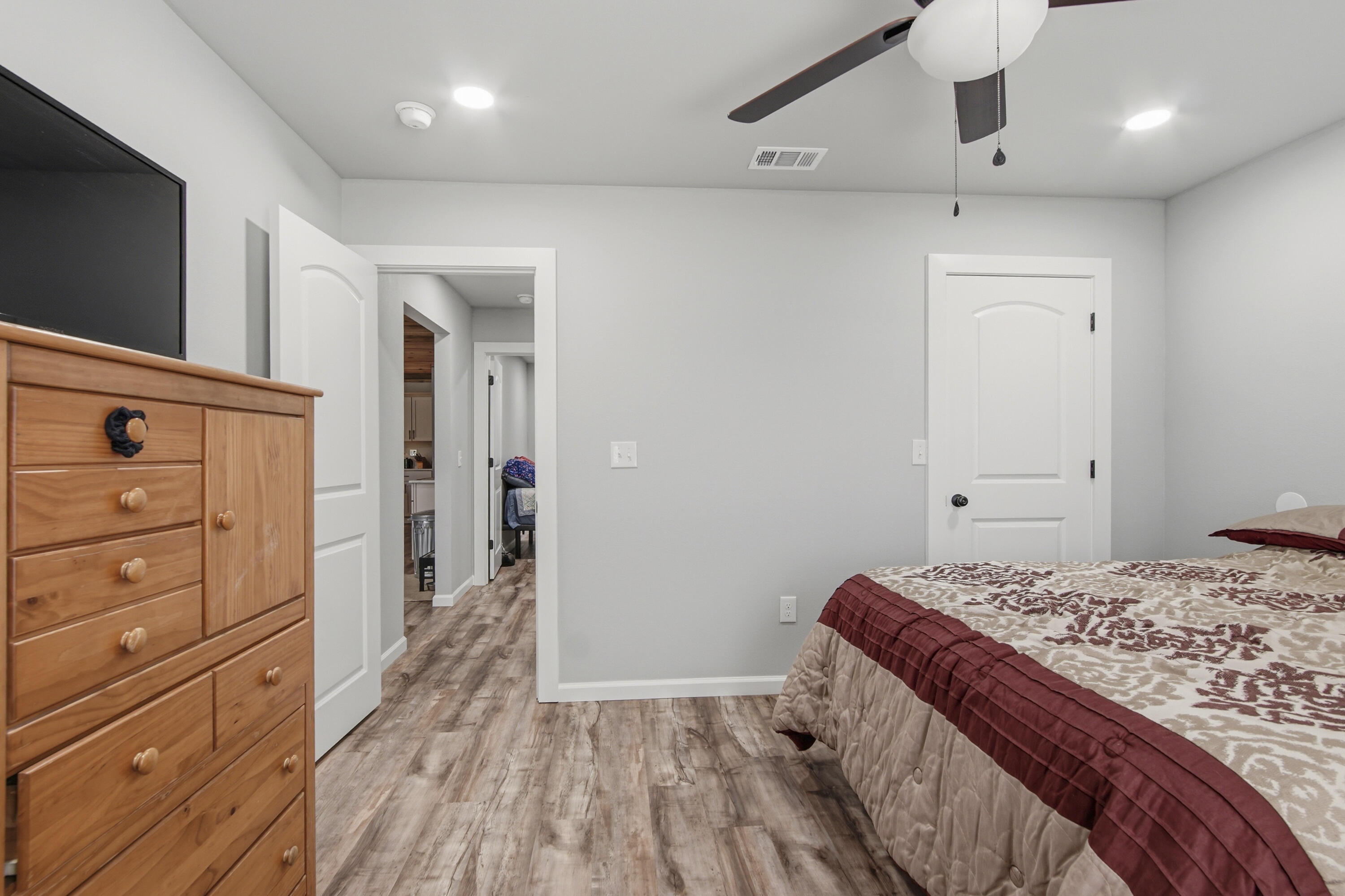 7514 Laird Road Florala, AL 36442 - Photo 27 of 48 a bedroom with a bed and a flat screen tv