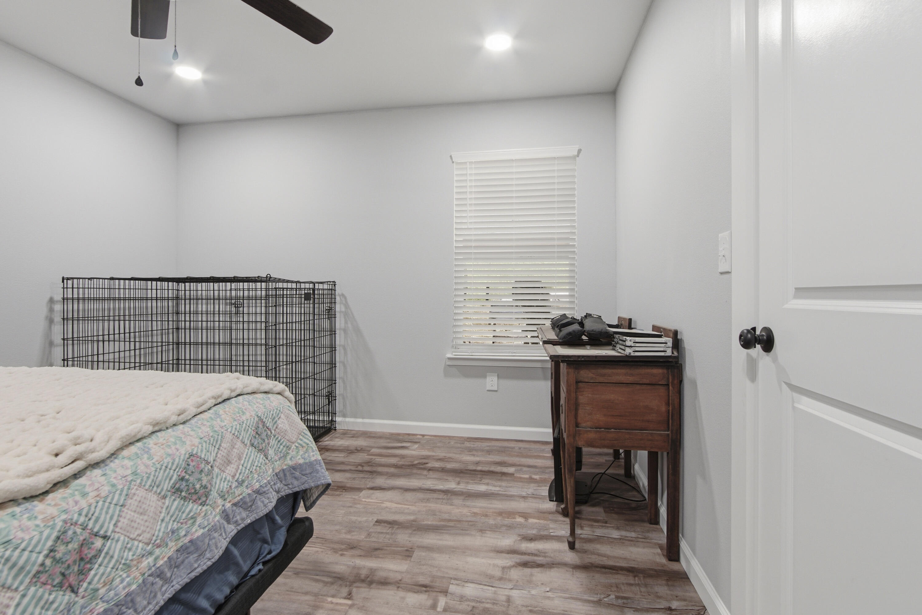 7514 Laird Road Florala, AL 36442 - Photo 30 of 48 a bedroom with a bed and a table