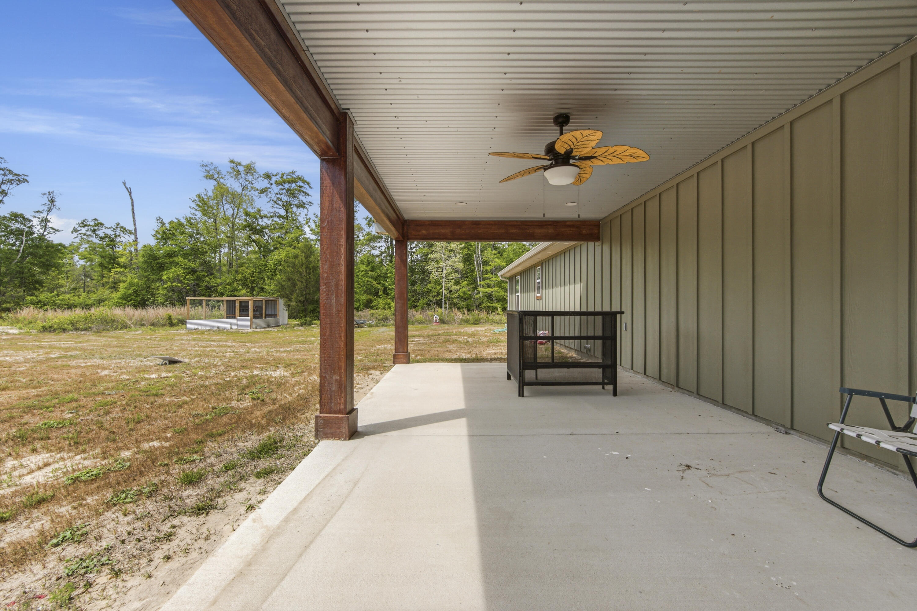 7514 Laird Road Florala, AL 36442 - Photo 42 of 48 a view of a porch with furniture and a yard