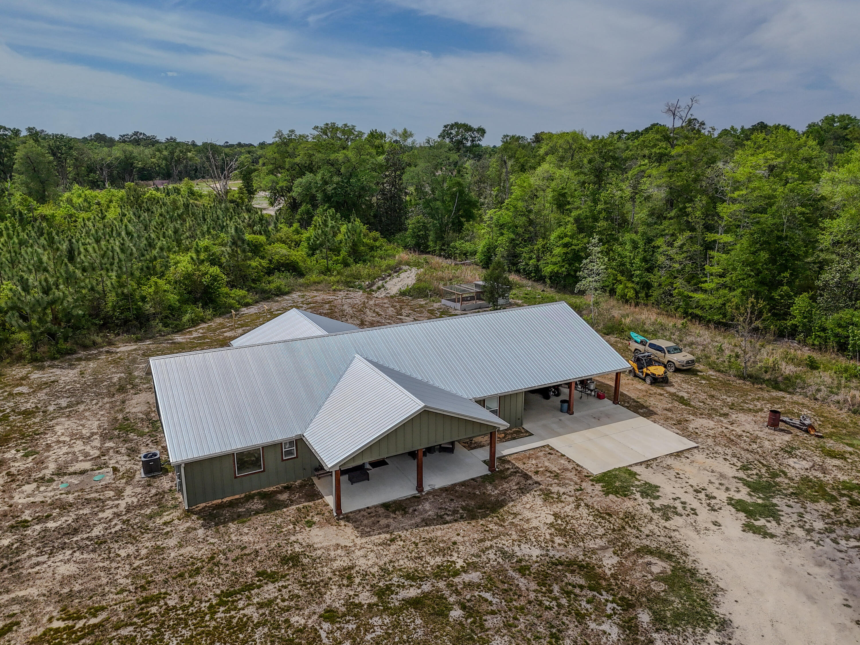 7514 Laird Road Florala, AL 36442 - Photo 46 of 48 an aerial view of a house with a yard and lake view