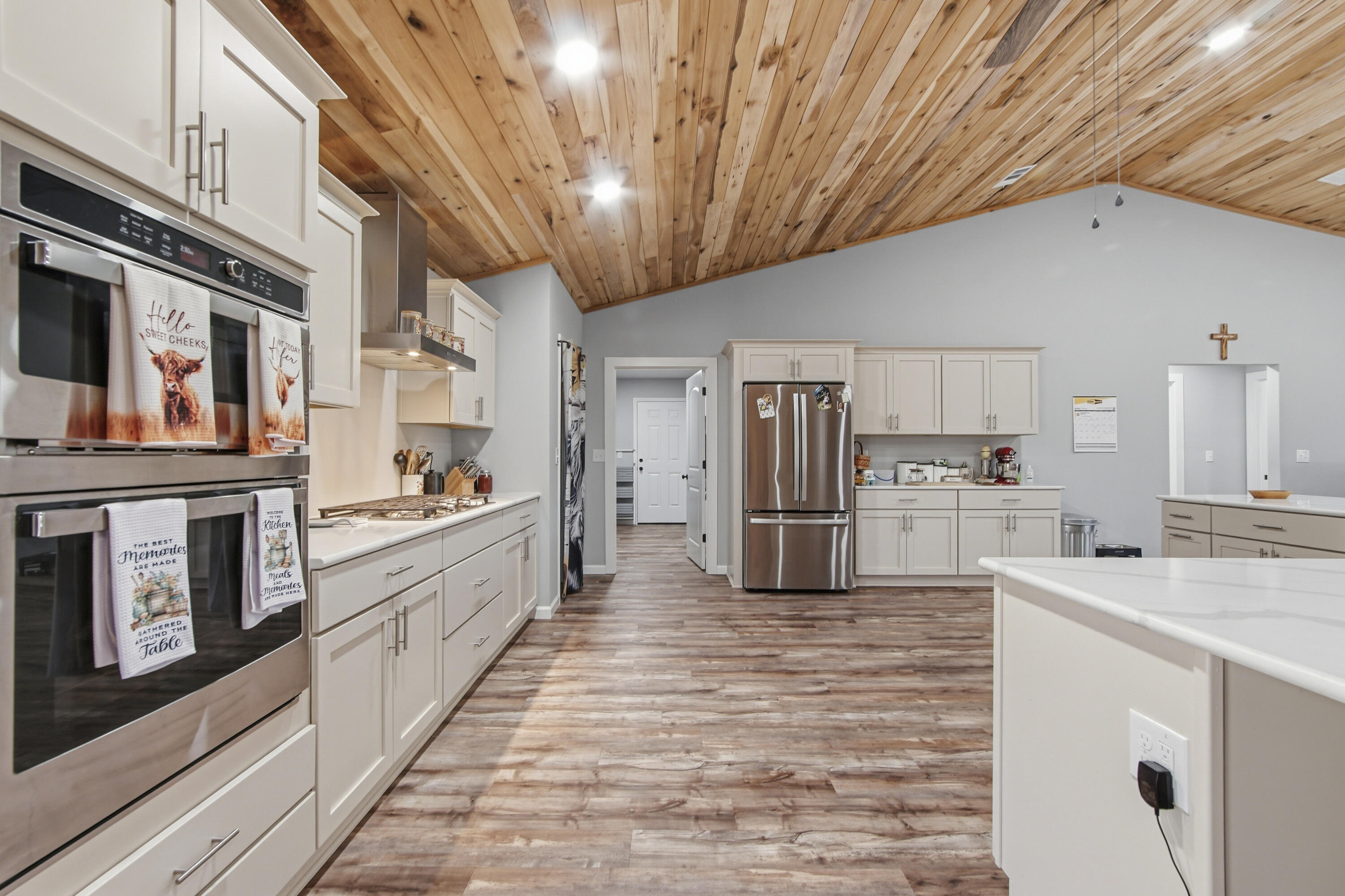 7514 Laird Road Florala, AL 36442 - Photo 10 of 48 a large kitchen with a large counter top appliances and cabinets
