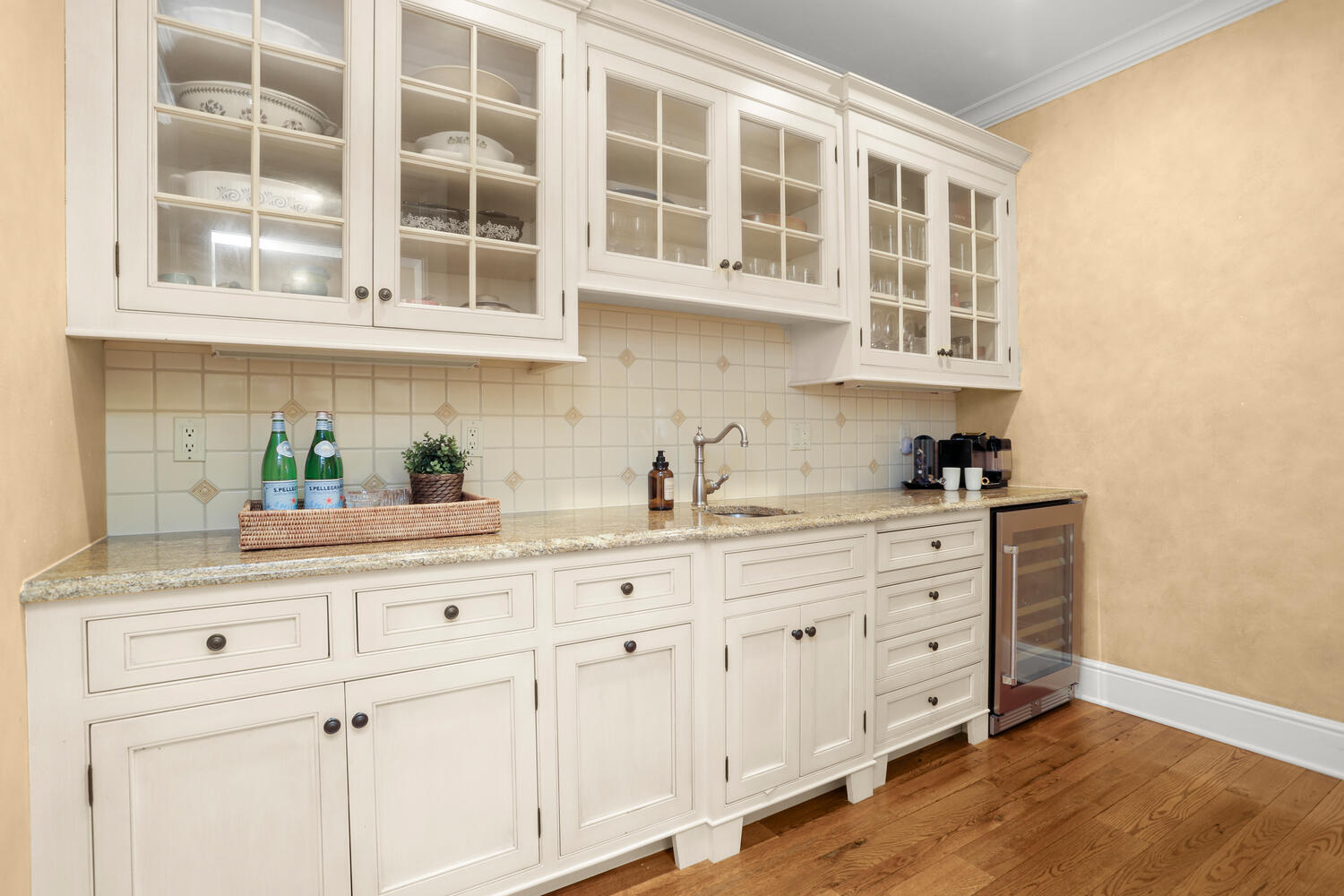 253 Middlesex Road Darien, CT 06820 - Photo 17 of 40 a kitchen with stainless steel appliances granite countertop white cabinets and window