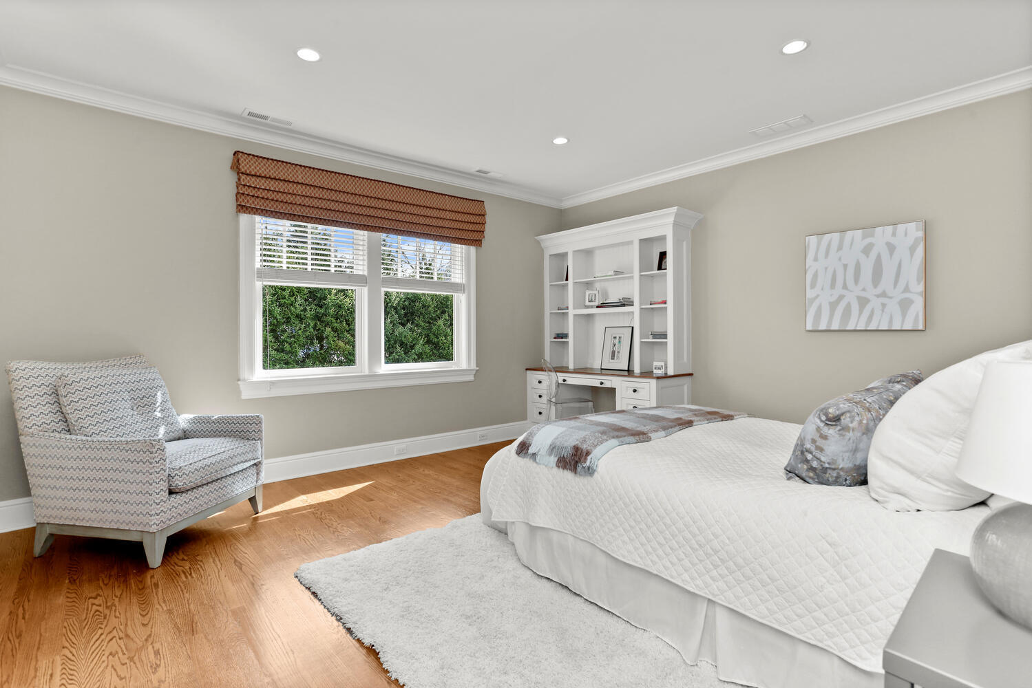 253 Middlesex Road Darien, CT 06820 - Photo 24 of 40 a bedroom with a bed and a couch