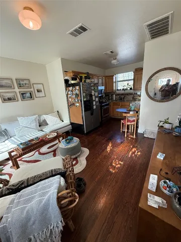 a bathroom with a toilet and a bathtub