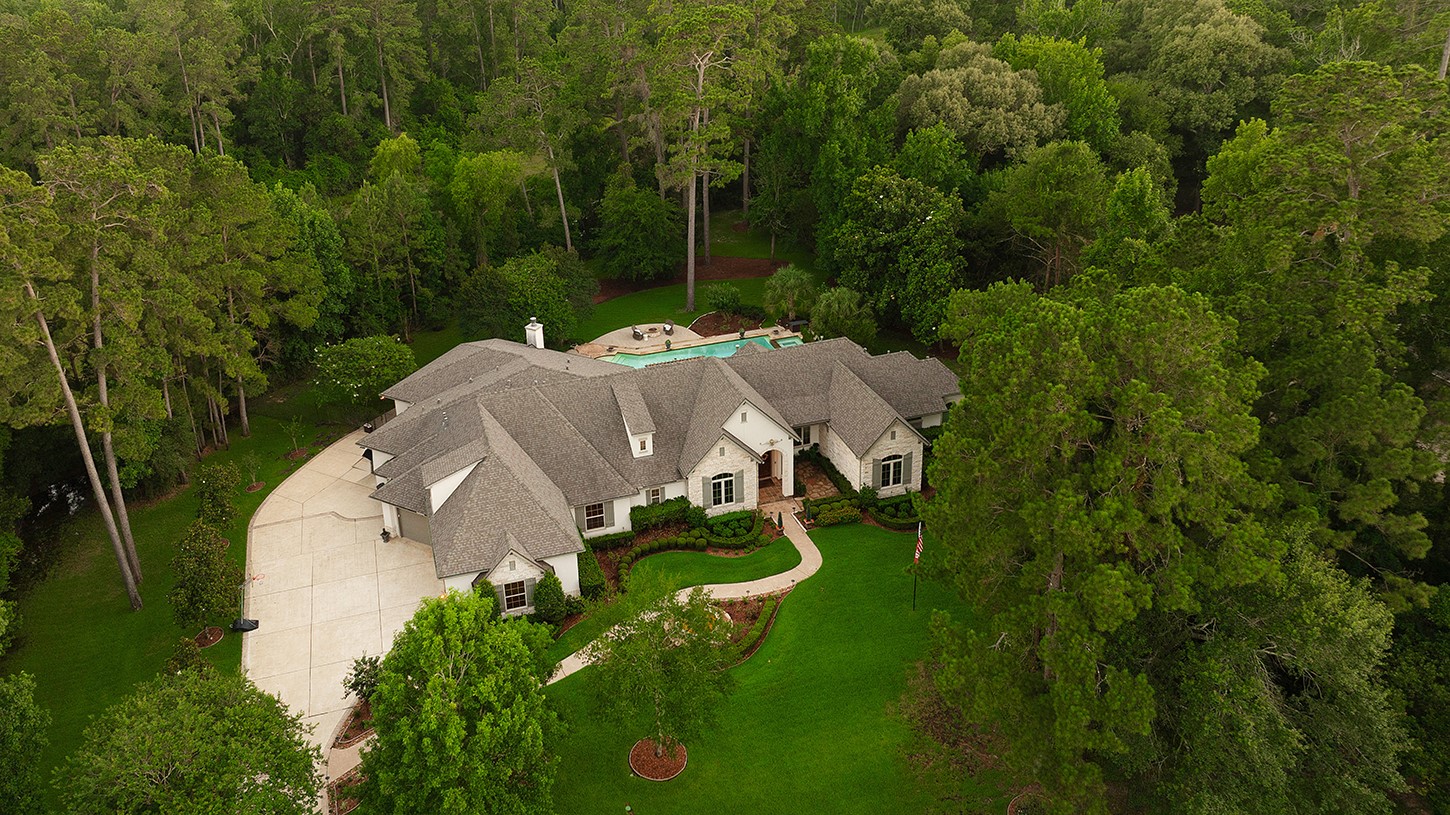 119 Angel Leaf Road The Woodlands, TX 77380 - Photo 48 of 50 an aerial view of a house with pool