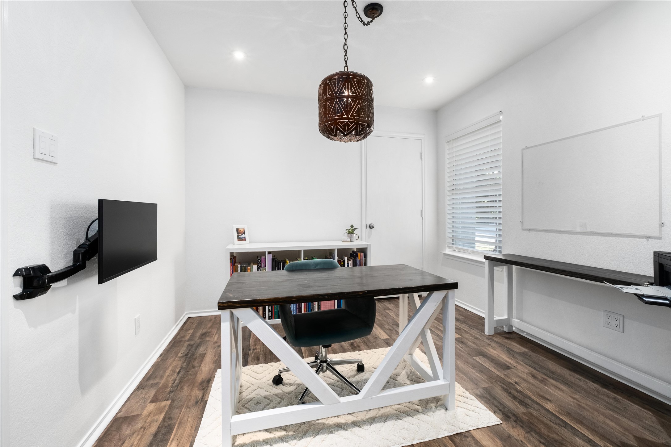 102 Woodley Road Leander, TX 78641 - Photo 15 of 24 a view of a workspace with furniture