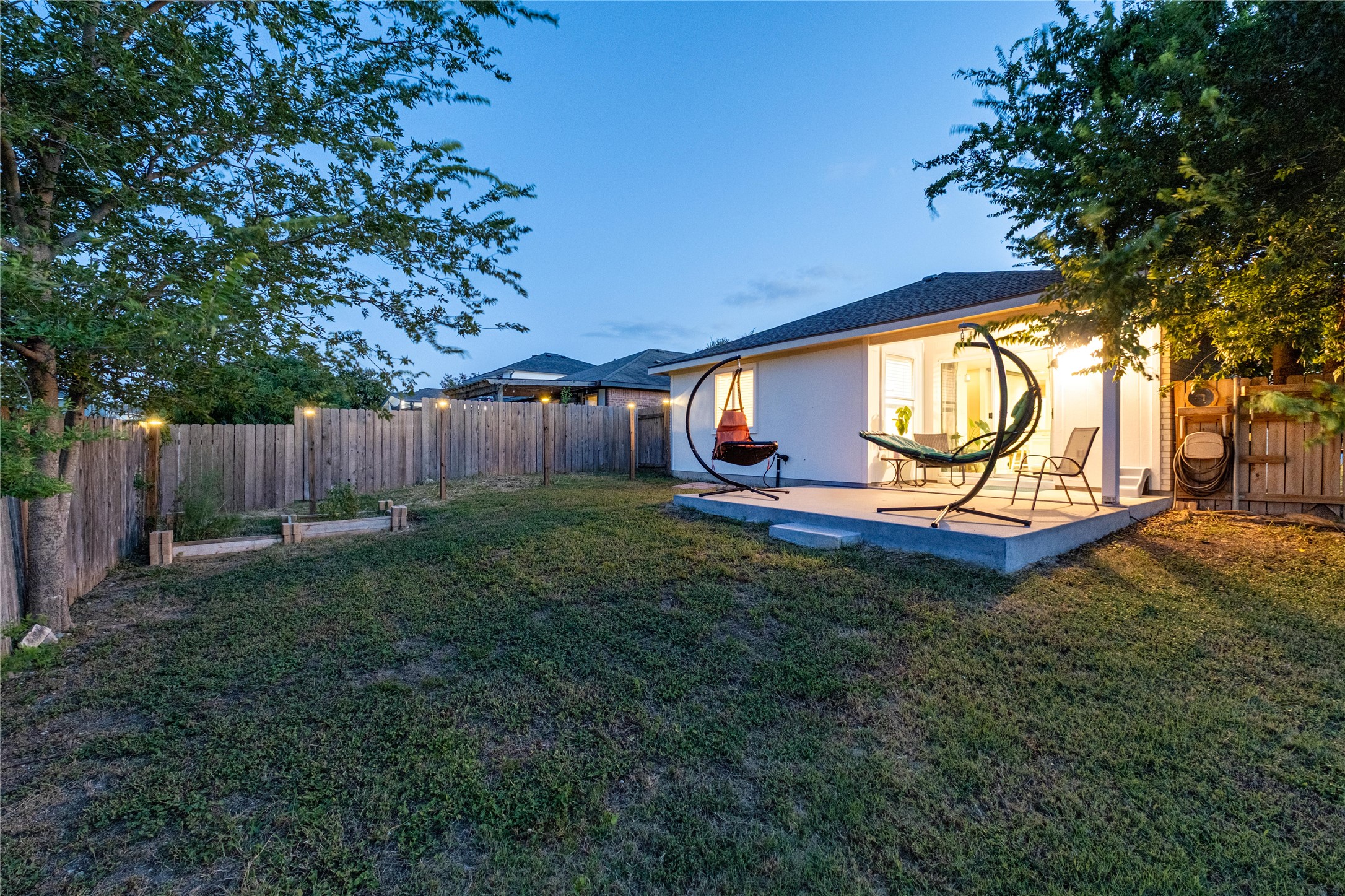 102 Woodley Road Leander, TX 78641 - Photo 21 of 24 a view of outdoor space with garden and entertaining space