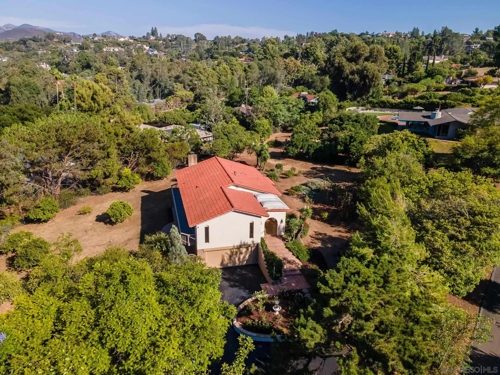 16456 Martincoit Road Poway, CA 92064 - Photo 1 of 55 an aerial view of a house with a yard