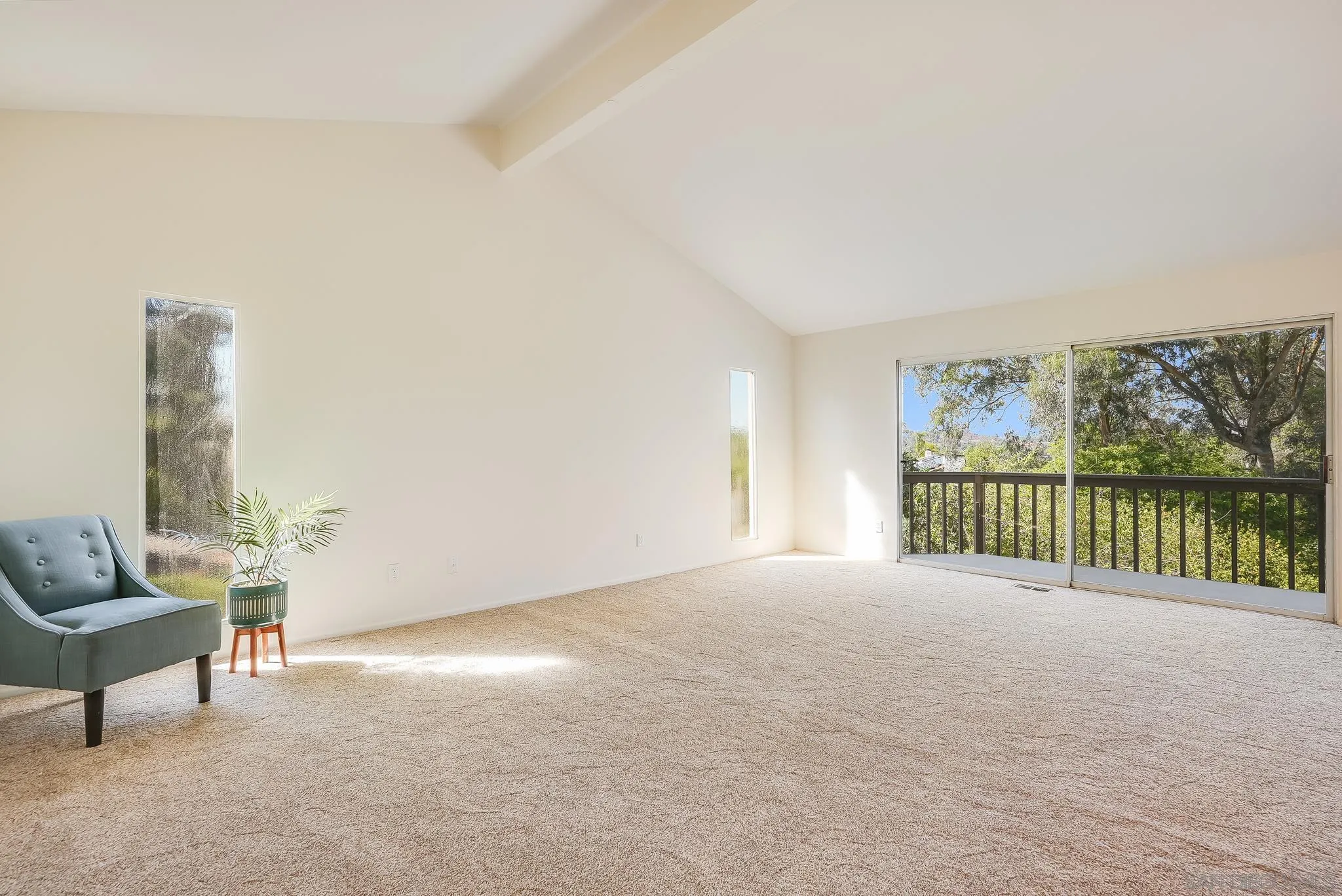 16456 Martincoit Road Poway, CA 92064 - Photo 14 of 55 a view of a room with furniture and a window