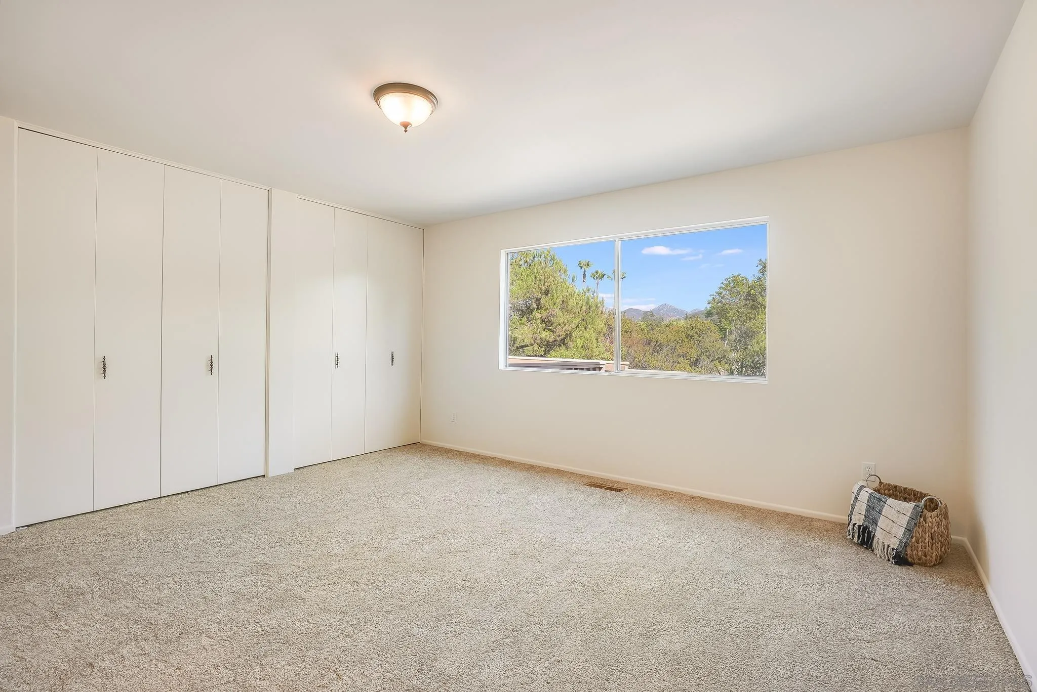 16456 Martincoit Road Poway, CA 92064 - Photo 30 of 55 a view of an empty room with a window