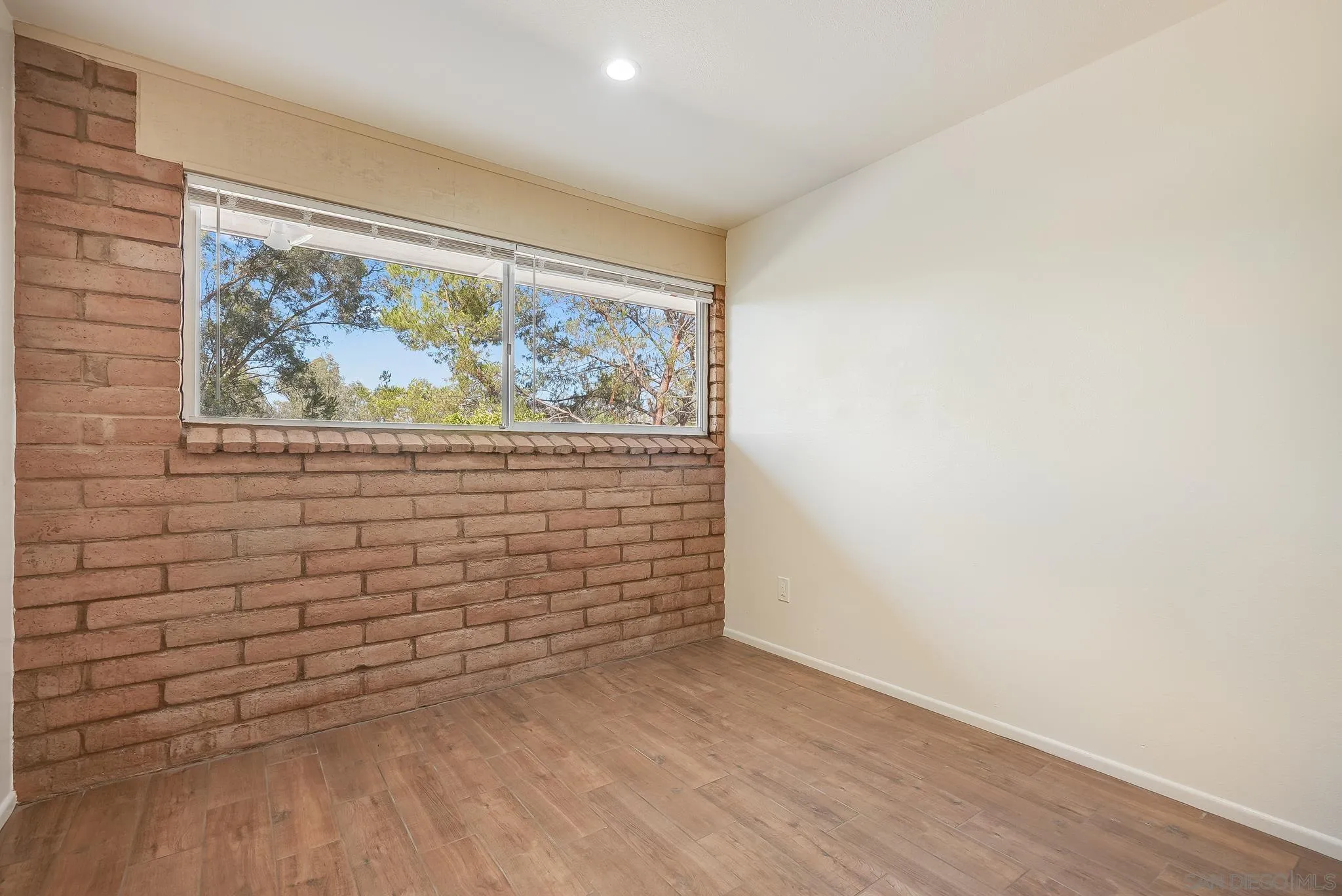 16456 Martincoit Road Poway, CA 92064 - Photo 43 of 55 a view of a small space with wooden floor