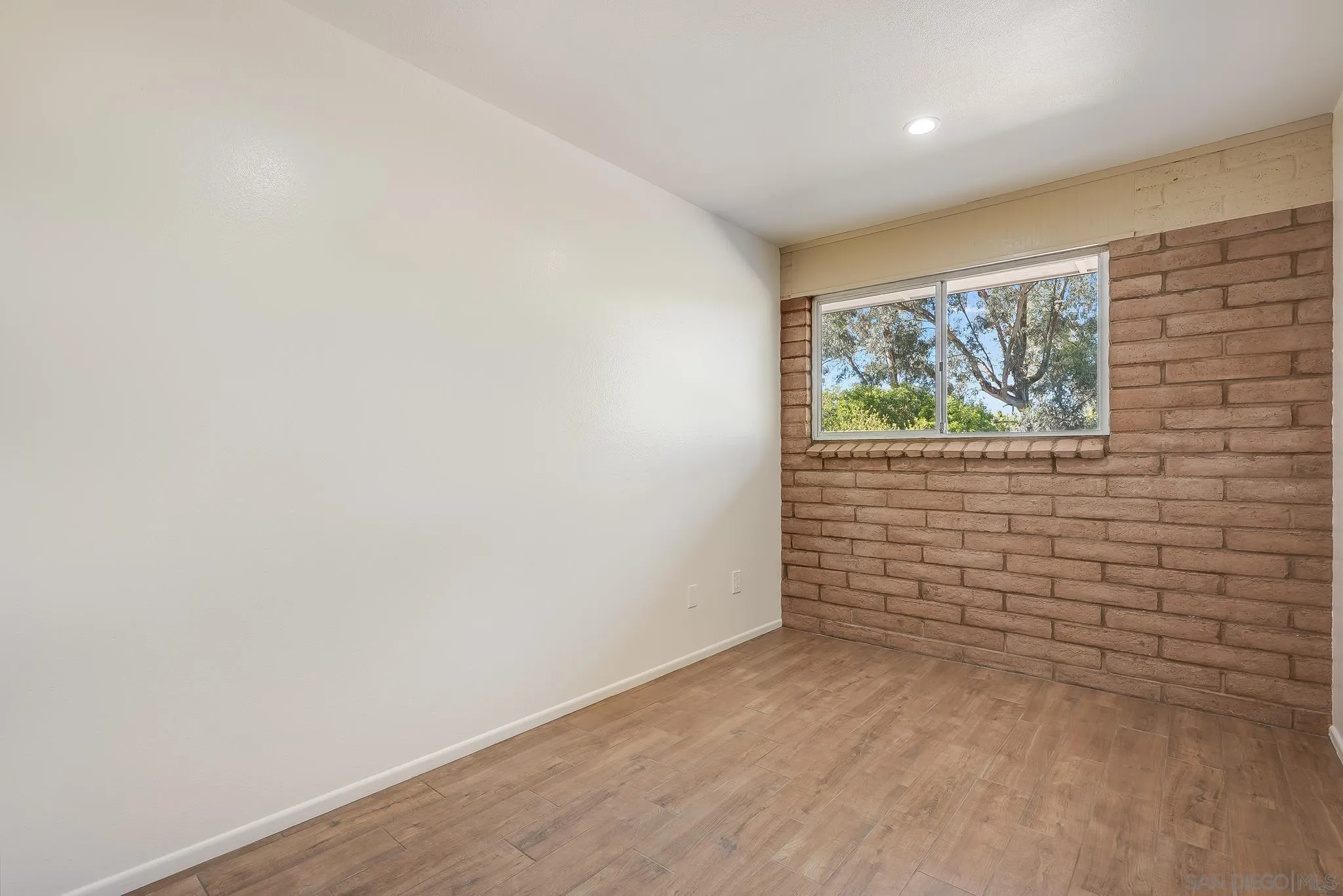 16456 Martincoit Road Poway, CA 92064 - Photo 47 of 55 an empty room with windows
