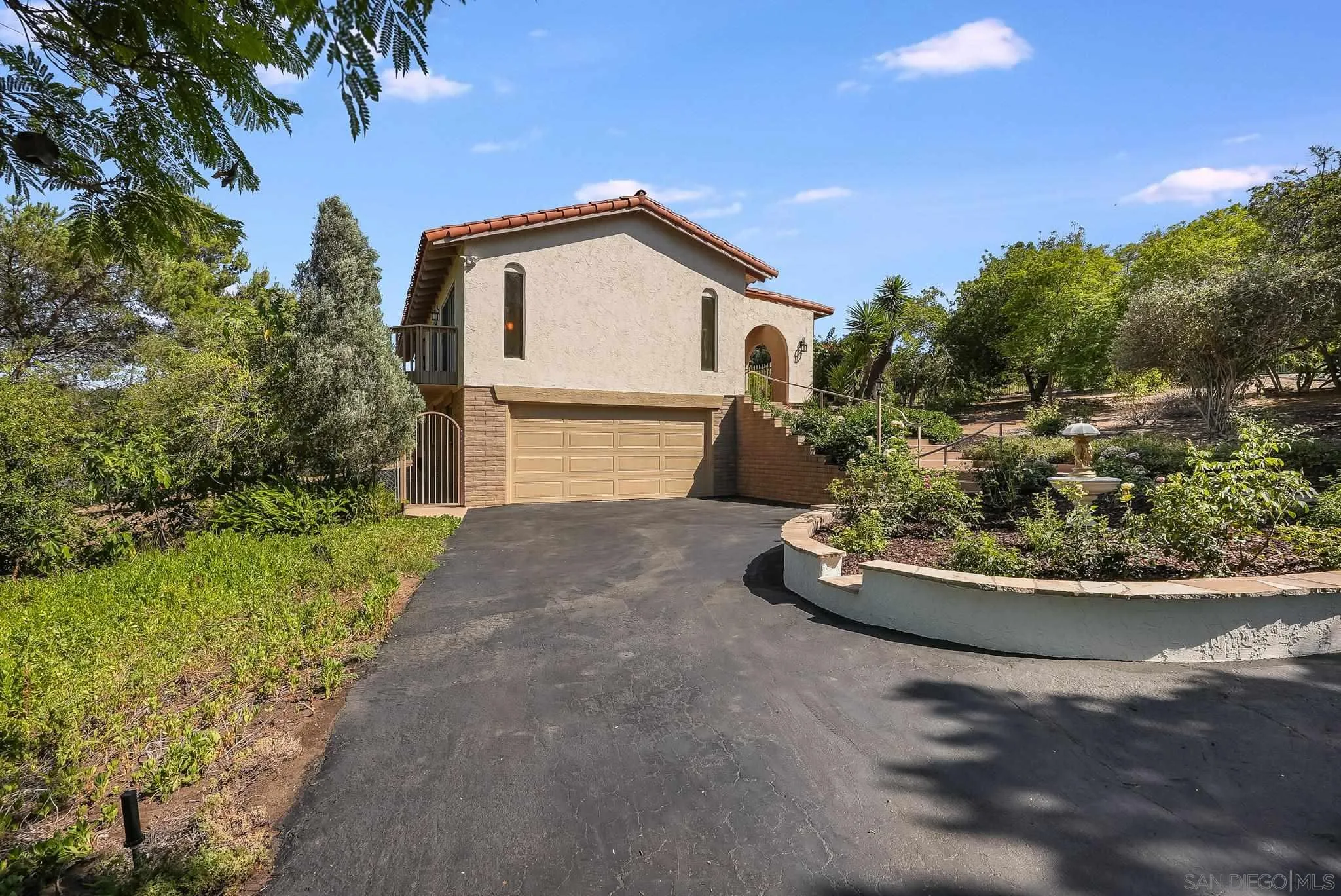16456 Martincoit Road Poway, CA 92064 - Photo 52 of 55 a front view of a house with a yard
