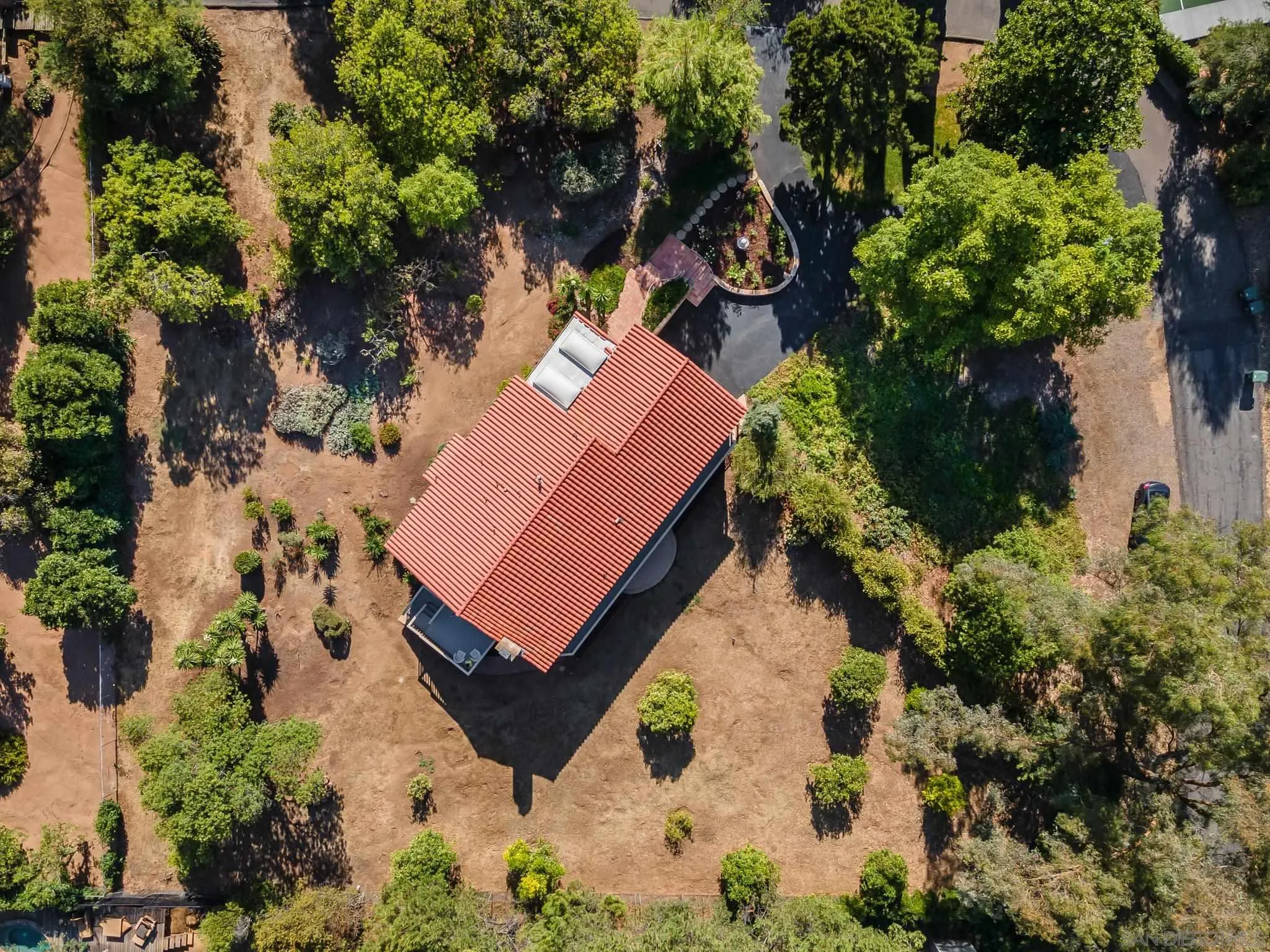 16456 Martincoit Road Poway, CA 92064 - Photo 53 of 55 an aerial view of a house with a yard and garden