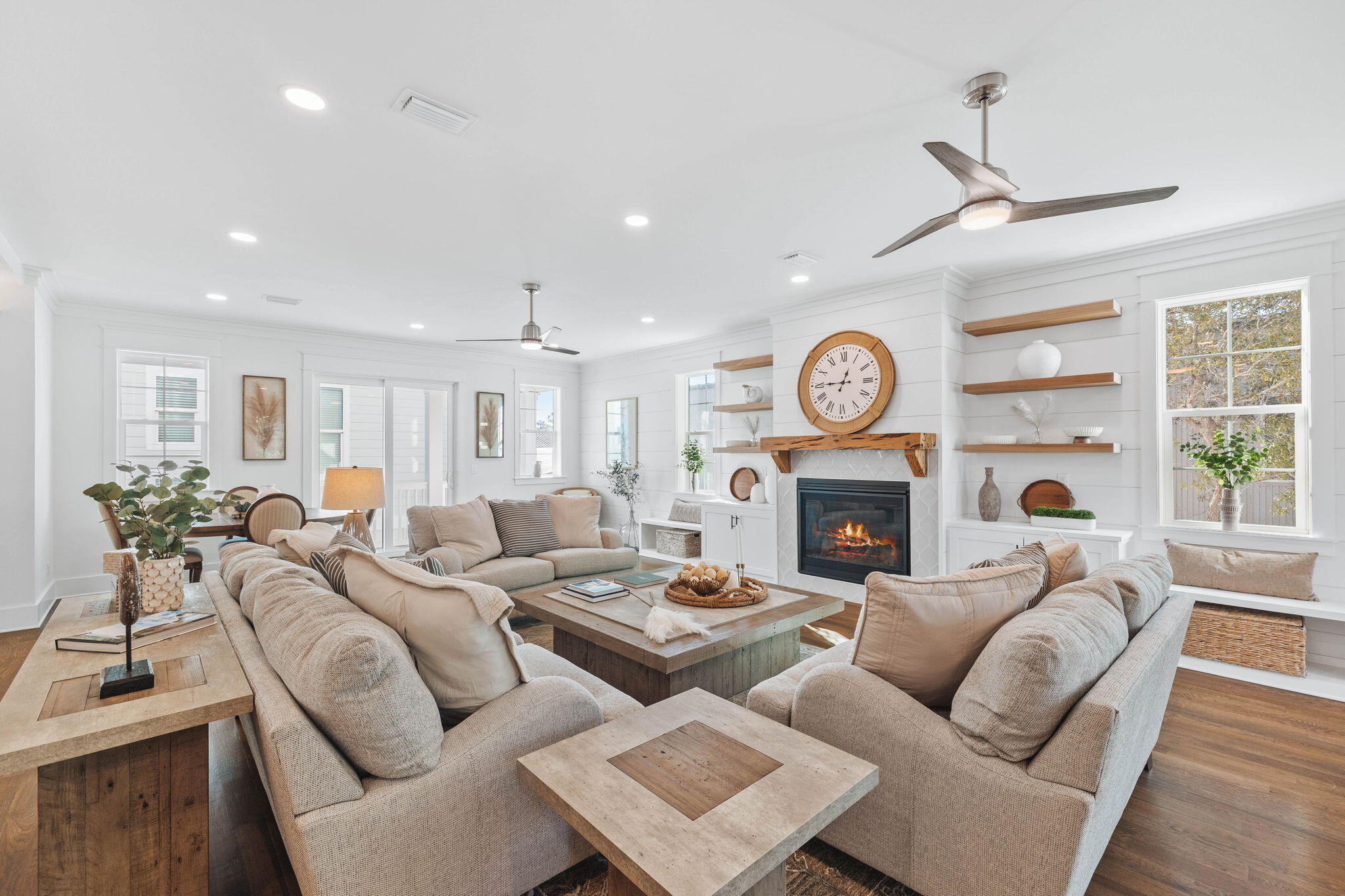 155 Grayton Boulevard Santa Rosa Beach, FL 32459 - Photo 5 of 51 a living room with fireplace furniture and a large window