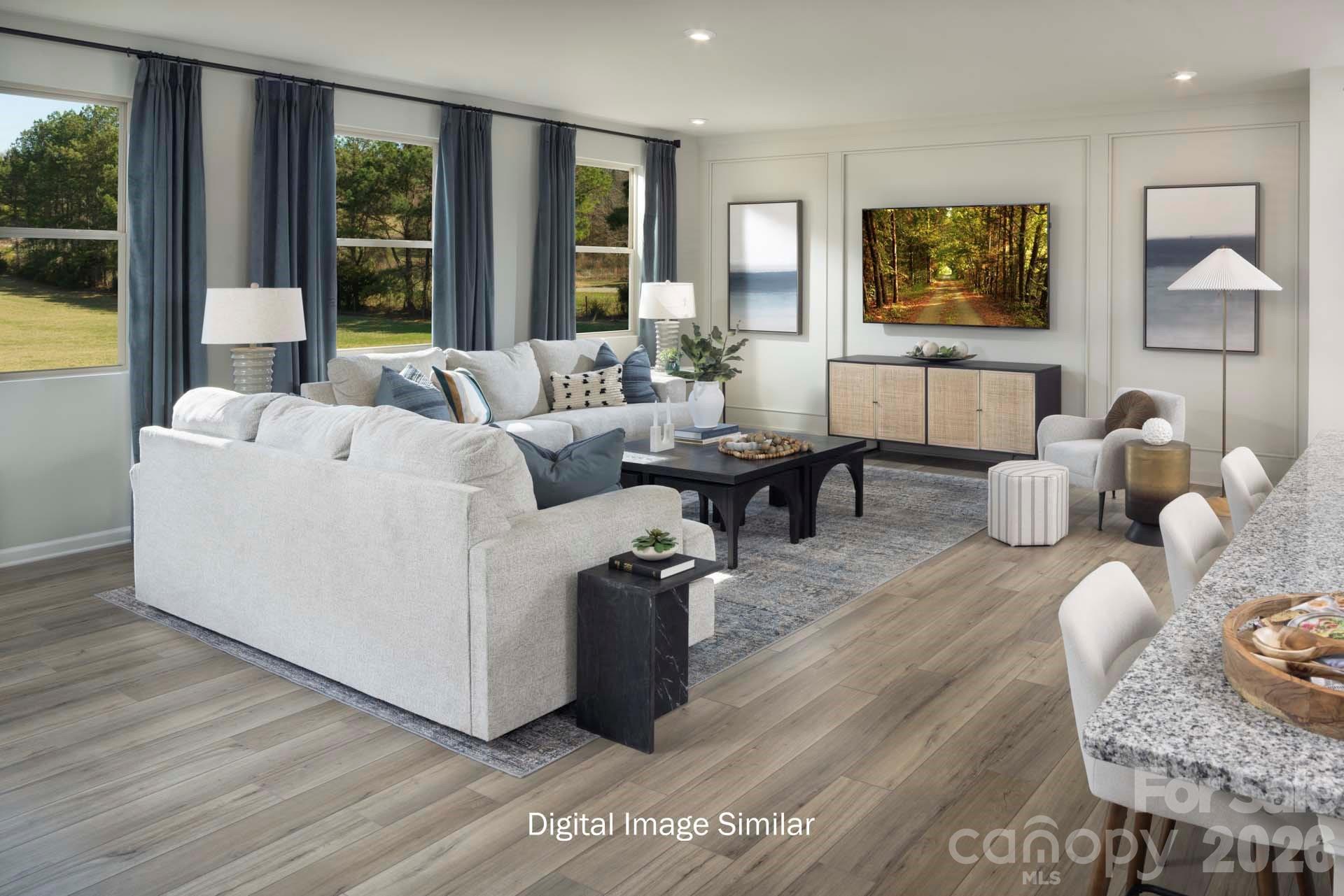 2550 Mabel Lane Monroe, NC 28110 - Photo 18 of 25 a living room with furniture and large window