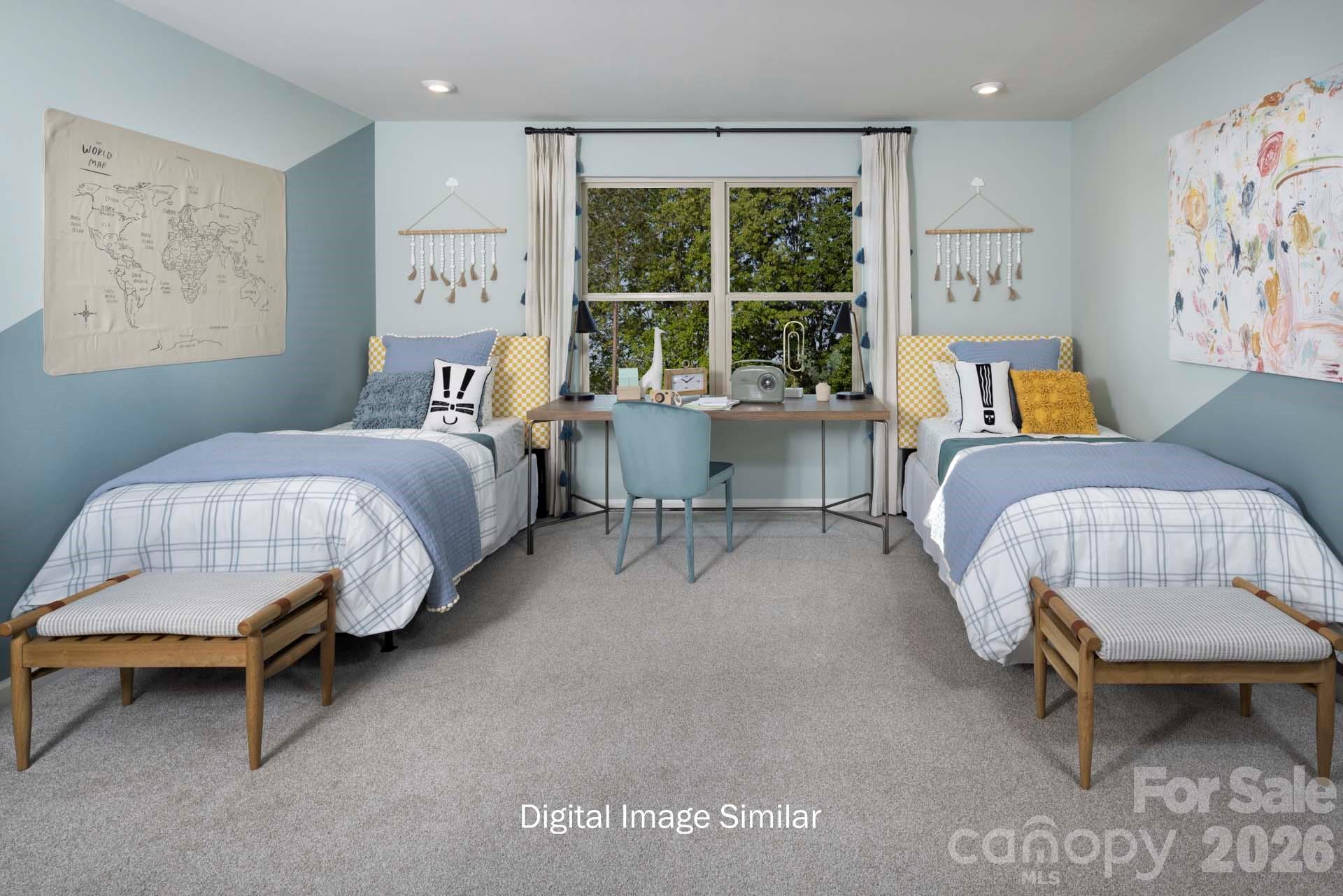 2550 Mabel Lane Monroe, NC 28110 - Photo 19 of 25 a bed room with a bed and a chair