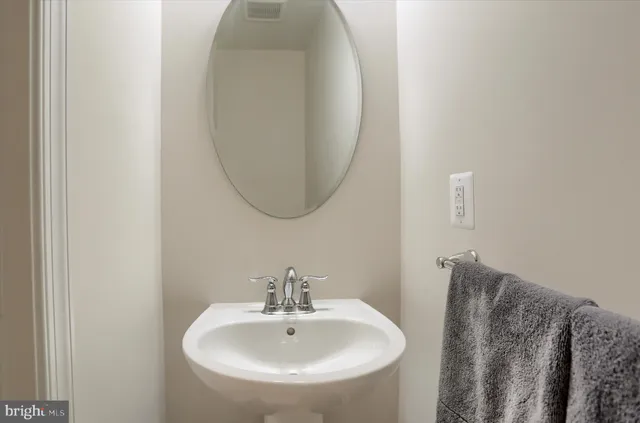 a spacious bedroom with a bed and window