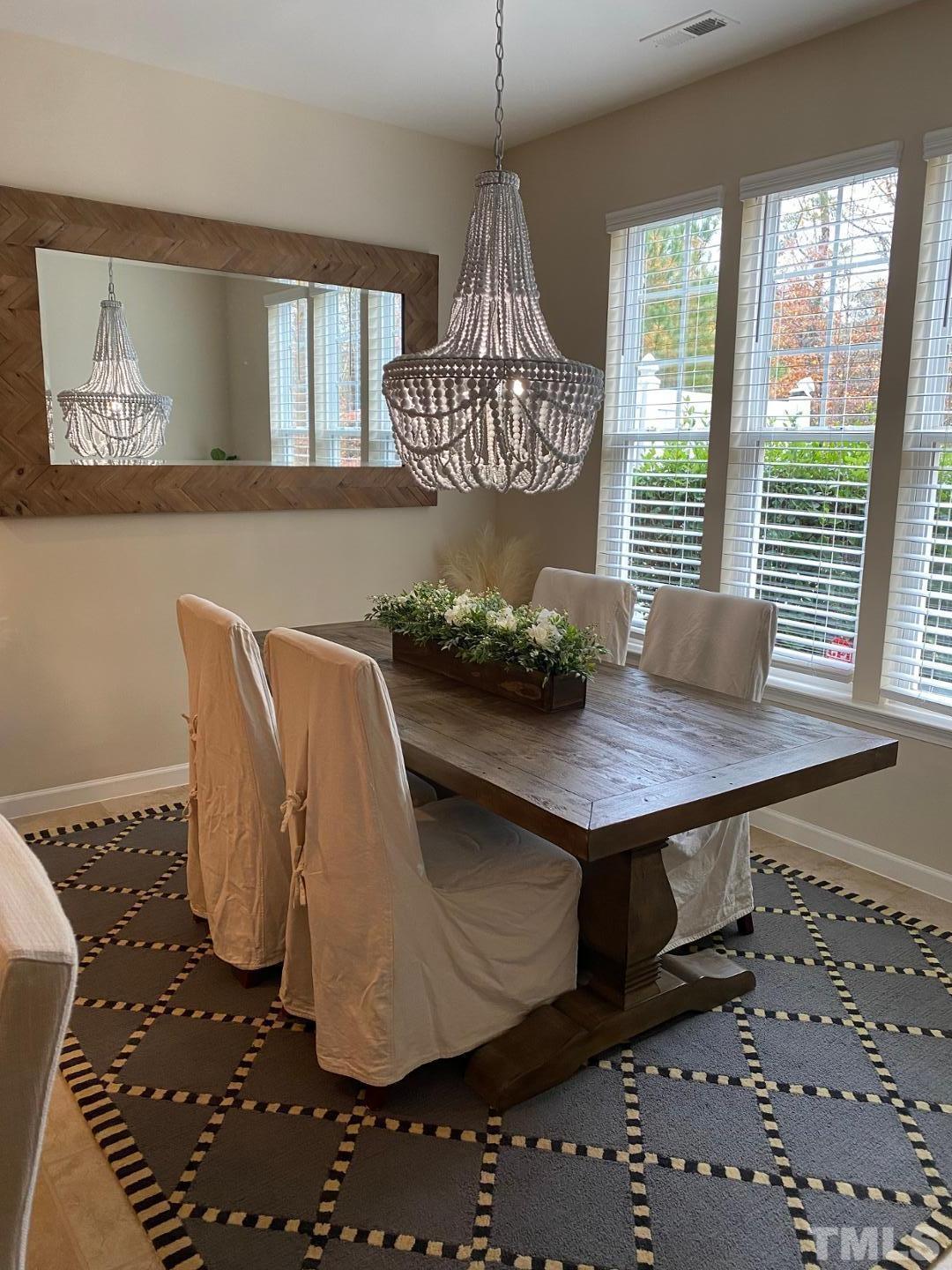 6006 McDevon Drive Raleigh, NC 27617 - Photo 2 of 12 a room with furniture and window