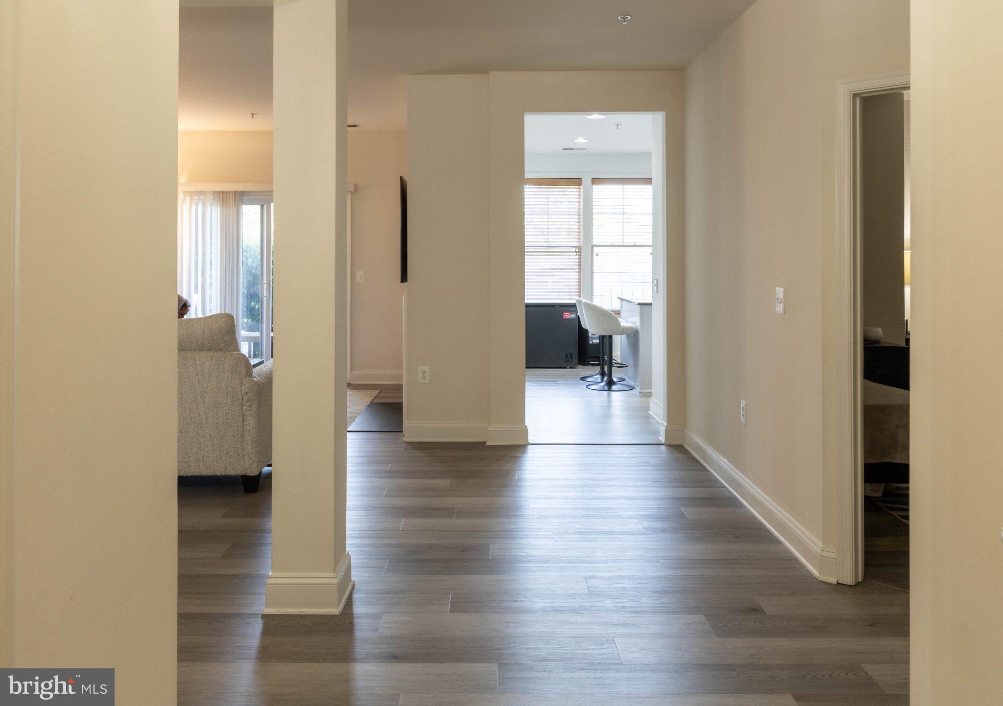 12824 Clarksburg Square Road, Unit 105 Clarksburg, MD 20871 - Photo 61 of 96 Spacious hallway with modern elegance.
