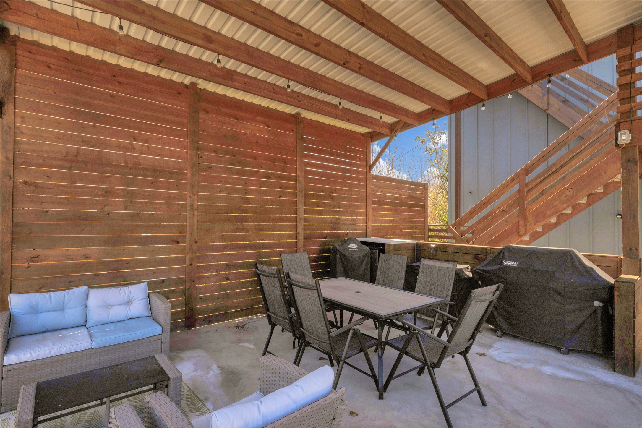 4227 Eck Lane Austin, TX 78734 - Photo 28 of 30 View of patio featuring outdoor dining space, grilling area, and an outdoor living space