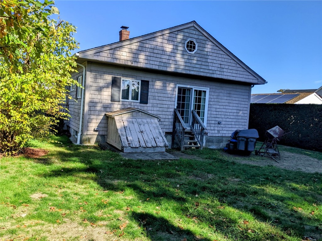 413 Kennedy Street Fall River, MA 02721 - Photo 18 of 23 Bk view; with Deck &Sliders